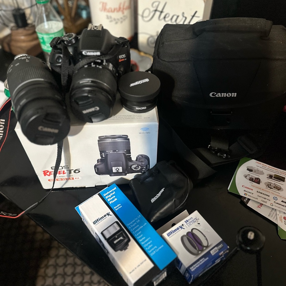 Cannon camera never been used with extra parts 1500 dollar value